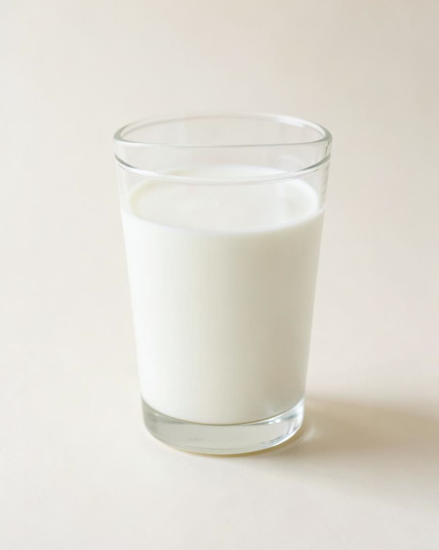 Milk, lactose-free on a light neutral background