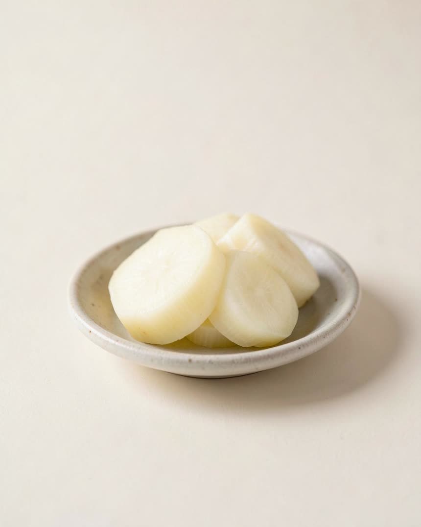 Water chestnuts on a light neutral background